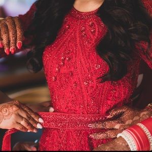 Red gown with hand embroidery perfect for any occasion!